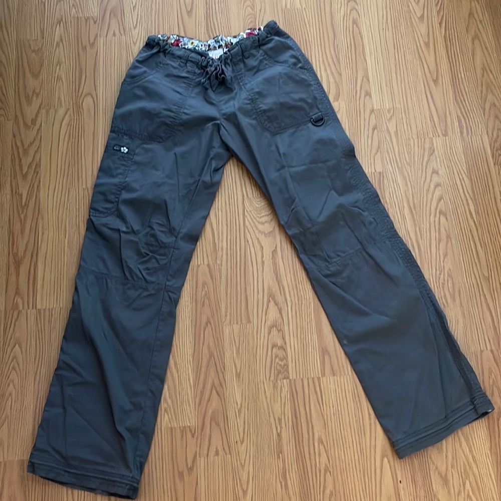 Koi small tall, gray carpenter style scrub pants.